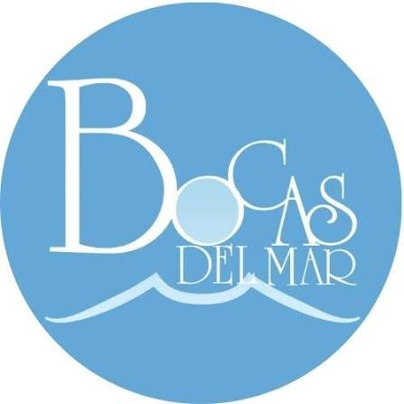 Circular blue logo featuring white stylized text reading'Bocas Del Mar' with a light blue wave motif underneath.
