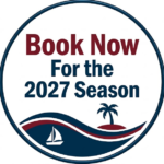 Screenshot 2026-10-05 at 12058 PM - Panama Sport Fishing Charters Circular badge with the message 'Book Now for the 2027 Season' and a blue-red waves motif featuring a palm tree and sailboat; call-to-action graphic for bookings.